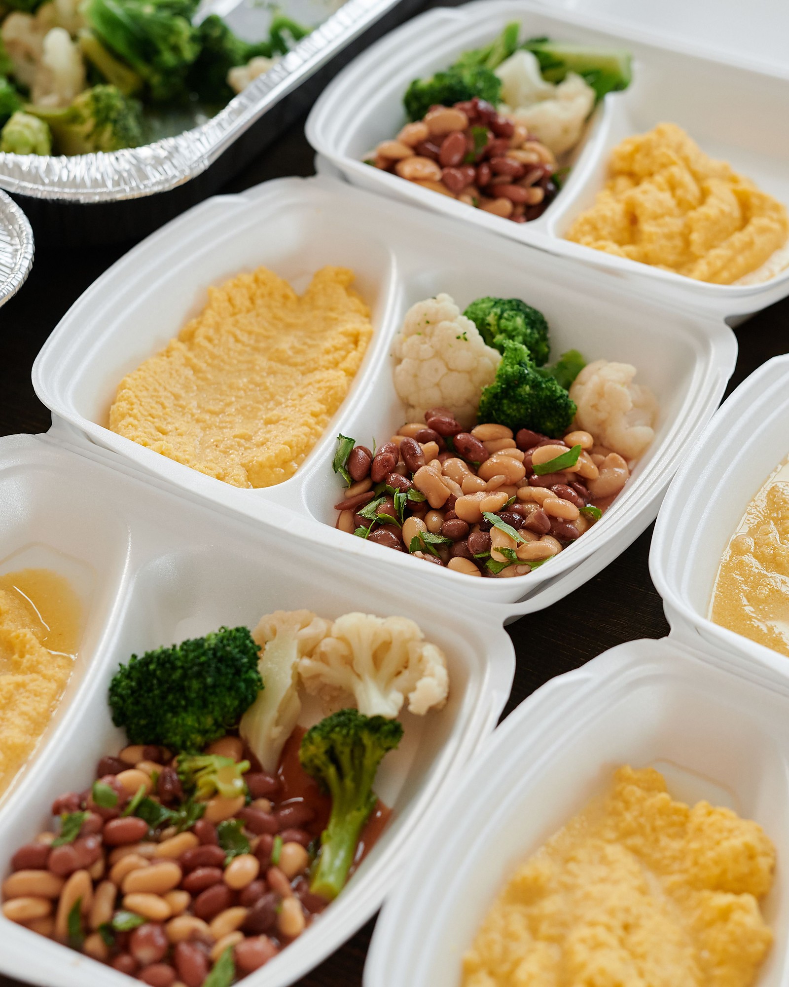 Individually portioned meal trays prepared for care facility residents